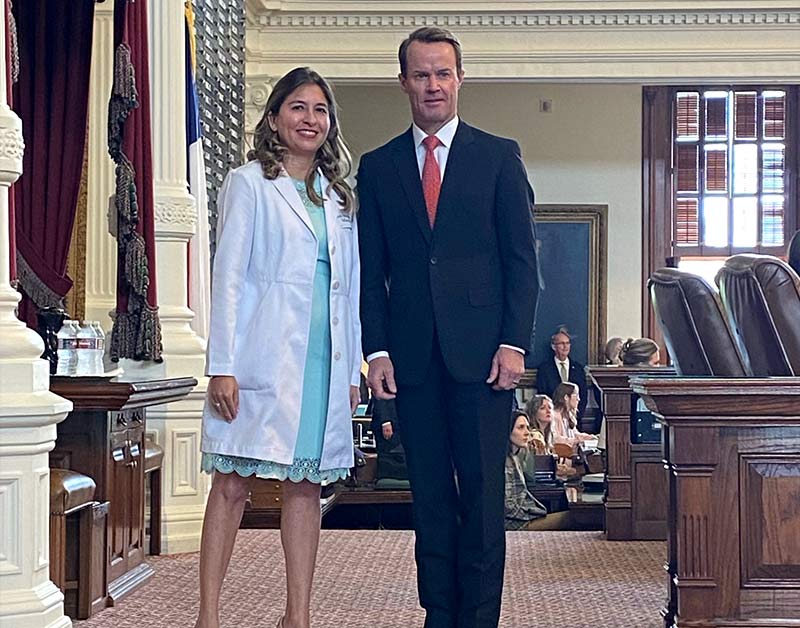 Dr. Linda May at the Texas Capitol with Senate representative